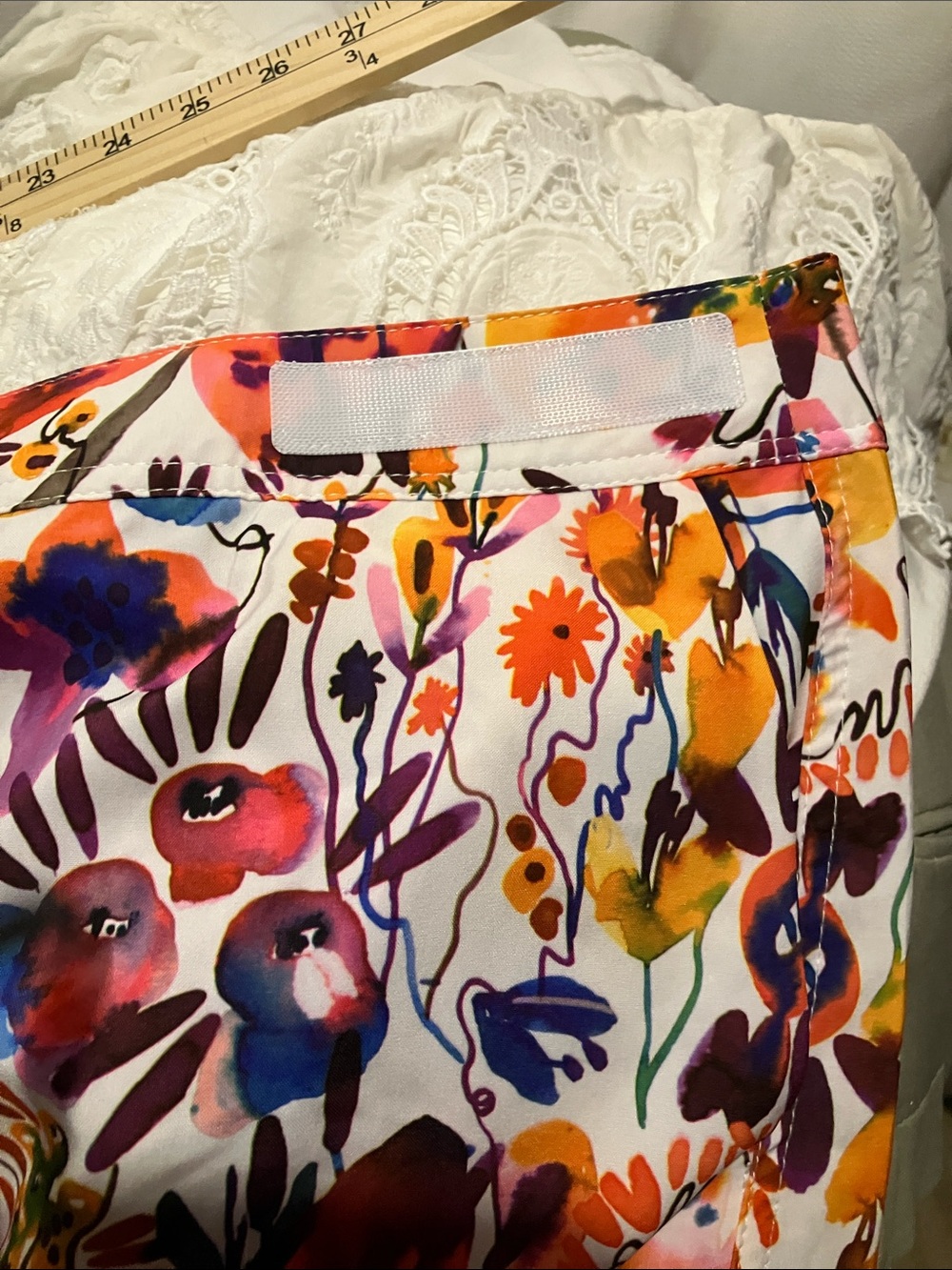 Ripskirt Hawaii Floral Mini Skirt in White with Orange and Purple Accents - Picture 10 of 10